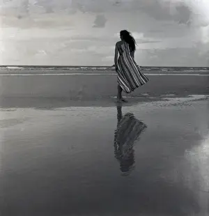 Woman on a twilight beach