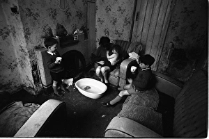Woman bathing baby, Falls Road, Northern Ireland