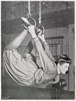 Exercises Prints: A woman using flying rings. Date: 1901