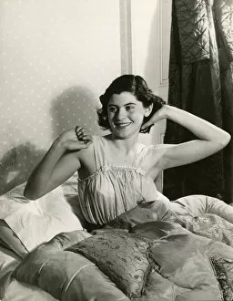 Stretching Collection: WOMAN WAKING 1940S