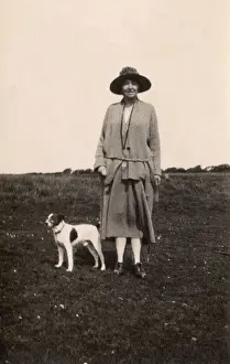 Walkies Prints: Woman out walking with a dog, Eastbourne, Sussex