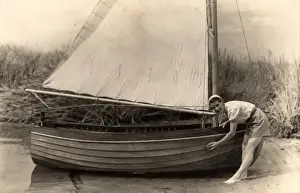 Upkeep Prints: Woman washing down boat