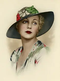 Woman wearing a brimmed hat