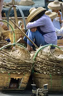Coolie Prints: Woman wearing coolie straw hat, Aberdeen harbour, Hong Kong