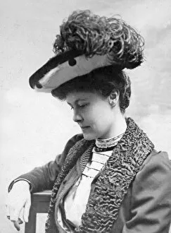 Woman wearing a feathered hat