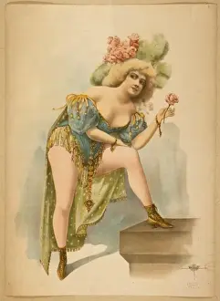 Woman wearing low cut green, blue, and yellow costume with f