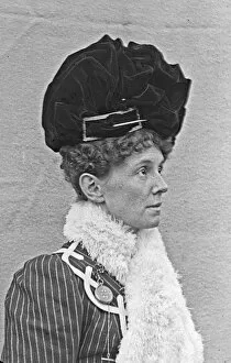 Images Dated 3rd February 2015: Woman wearing a tall black hat