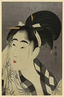 Woman wiping sweat