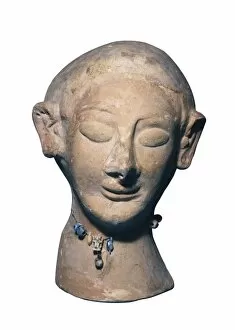 Carthaginian Collection: Womans head. Punic art. Terracotta sculpture