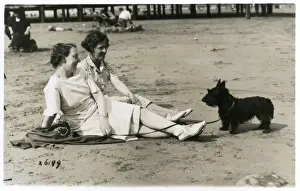 Scottie Prints: Two women on beach with Scots terrier