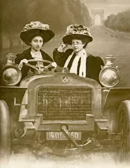 Two women in a car in a studio portrait, Paris