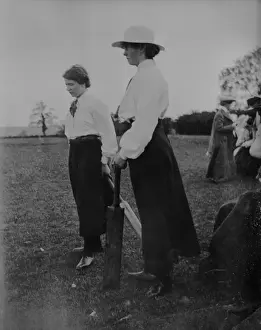 Women with cricket bats