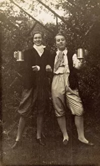 Two women in fancy dress with tankards