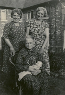 Images Dated 8th November 2011: Three women in back garden with doll