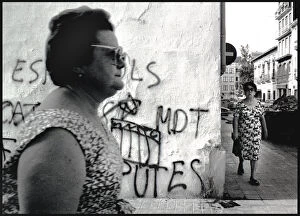Images Dated 30th August 2016: Two women and grafitti, Spain