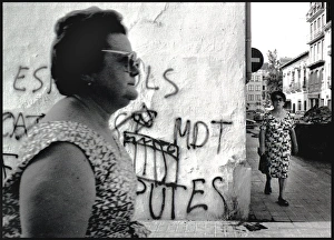 Images Dated 30th August 2016: Two women and grafitti, Spain