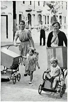 Phony Prints: Two women with infants and new baby gas masks, Sept 1939