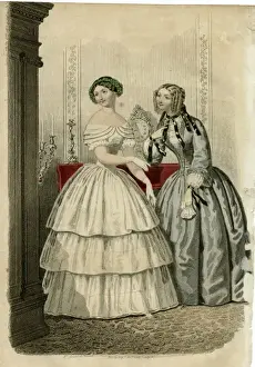 Two women in the latest French fashions