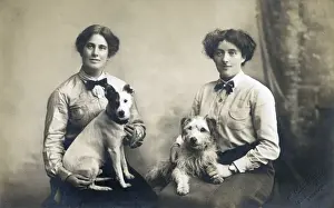 Two women with two little dogs