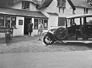 Whitewashed Prints: Two women outside a village shop with their car