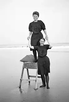 Two women in period bathing costumes on the beach - Atlantic