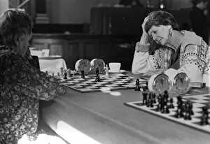 Chessboard Gallery: Women playing chess in a tournament