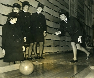Alison Gallery: Women police officers at a bowling alley