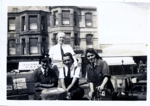 Colleague Prints: Four women police officers doing luggage search, WW2