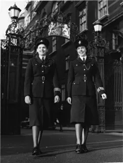 Two women police officers in a London street