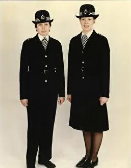 Policewoman Gallery: Two women police officers in new bowler hat, London