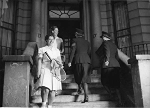 Women police officers in tennis gear, Pembridge Hall Women police officers in tennis gear, Pembridge Hall