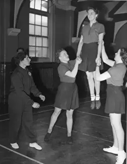 Women police officers training in a gym, London