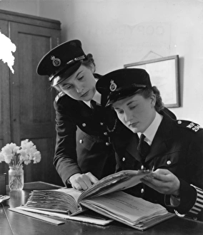 Policewomen Gallery: Two women police officers working in a station, London