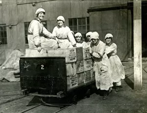Explosives Gallery: Women riding on cases of TNT, WW1