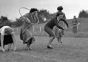 Hoops Prints: Women running a race with hoops