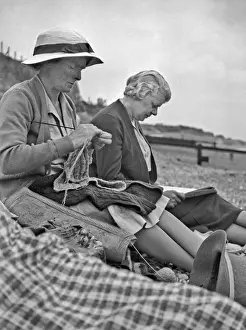 Aged Prints: Two women sitting on a beach