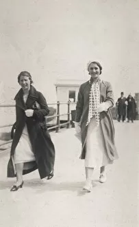 Aug17 Collection: Two women stroll along the seafront