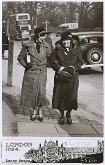 Two women strolling along a London street