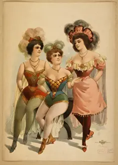 Three women in tights and feathers