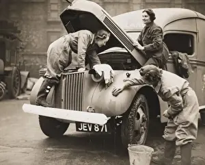 Women washing an ambulance WWII