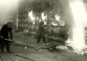 Coke Collection: Women workers raking out white hot coke, Vauxhall