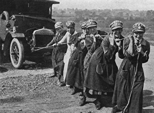 Ambulances Gallery: Womens Legion pulling a broken down ambulance, WWI