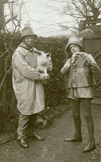 Pigs Collection: Rather wonderful pair (possibly father and son?) dressed as Tom, Tom the Pipers Son
