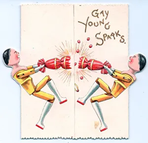 Images Dated 6th July 2018: Two wooden dolls pulling a cracker on a greetings card