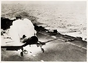 Flames Prints: World War II - Corsair lands in flames on aircraft carrier