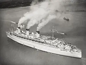 Returns Prints: World War II Ocean liner Queen Mary returns to Southampton