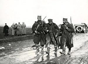 Images Dated 2nd December 2011: Wounded soldier on muddy road, Macedonian Front, WW1