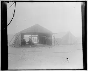 Rebuilding Gallery: Wright brothers rebuilding their glider in a wooden shed ere