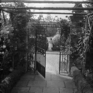 Images Dated 22nd January 2016: Wrought iron gate in a garden