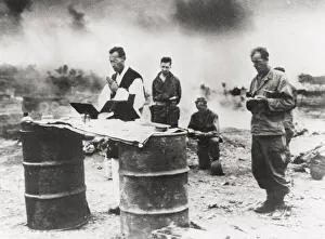 Leads Collection: WW II - American chaplain leads prayers Le Shima, Pacific